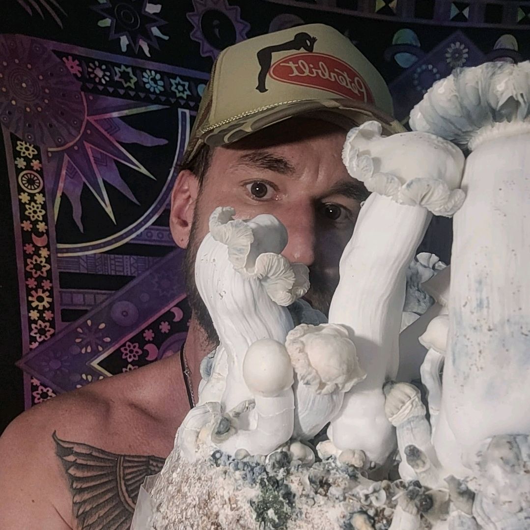 MoonDaddy holding a fresh flush of his genetics